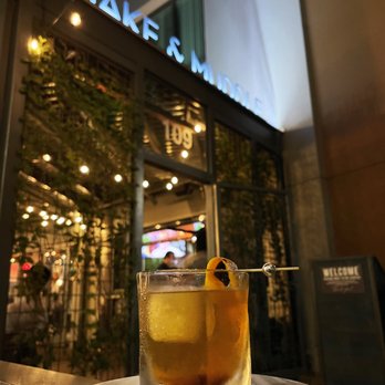 Atmosphere Construction and Design - a drink on a plate outside a restaurant - General Contractors Near Me - National City, California