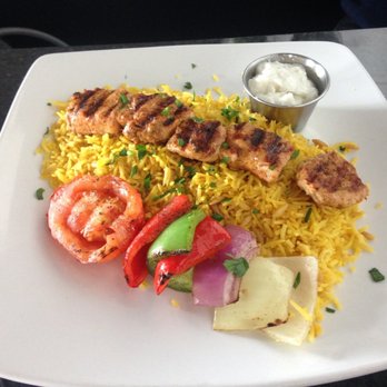 Zeta's Grill - Chicken Kebab (Kafa Meshwi) with grilled veggies and Saffron Basmati Rice. Garlic sauce (toum) on the side. - Mediterranean Near Me - Avondale, Arizona Zeta's Grill - Chicken Kebab (Kafa Meshwi) with grilled veggies and Saffron Basmati Rice. Garlic sauce (toum) on the side. - Mediterranean Near Me - Avondale, Arizona