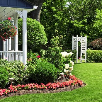 Apex Outdoor Solutions - a front yard of a house - Lawn Services Near Me - Portage, Michigan