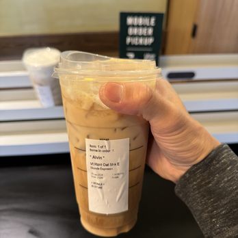 Starbucks - a hand holding a cup of iced coffee - Coffee & Tea Near Me - Kapaʻa, Hawaii Starbucks - a hand holding a cup of iced coffee - Coffee & Tea Near Me - Kapaʻa, Hawaii