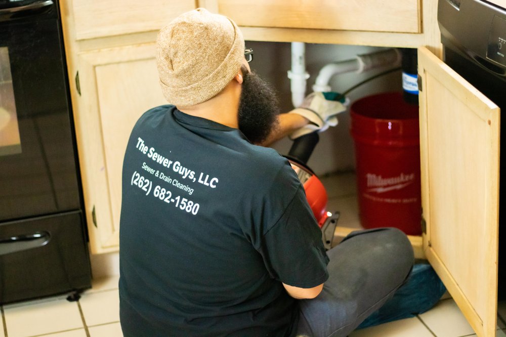 Slide of The Sewer Guys