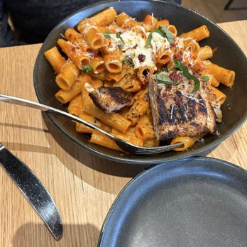 The Kennedy - The star: Spicy Rigatoni pasta with blackened chicken Can get grilled or fried chicken strips - Wine Bars Near Me - Knoxville, Tennessee The Kennedy - The star: Spicy Rigatoni pasta with blackened chicken Can get grilled or fried chicken strips - Wine Bars Near Me - Knoxville, Tennessee