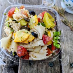 The Vegan Cheese Lady - Italian pasta salad seasonal. bowtie pasta,fresh picked zucchini, squash, broccoli, black olives, bell peppers, tomatoes & italian dressing.