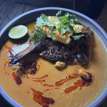 Dōgon - The Curry Branzino! This melted in my mouth and I have to go back and order this again!! - Caribbean Near Me - Washington, DC, District of Columbia Dōgon - The Curry Branzino! This melted in my mouth and I have to go back and order this again!! - Caribbean Near Me - Washington, DC, District of Columbia