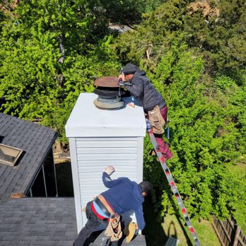 Brother G Construction - two men working on a roof - Roofing Near Me