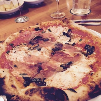 Pastaria - The Holmes - They put the prosciutto on outside the oven at the end so it just melts into the pie! We got a second to go! - Italian Near Me - Clayton, Missouri Pastaria - The Holmes - They put the prosciutto on outside the oven at the end so it just melts into the pie! We got a second to go! - Italian Near Me - Clayton, Missouri