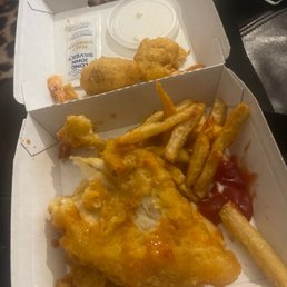 Fish plate that includes: Stale Fries, Cold shrimp, undercooked hush puppies, coleslaw was okay.