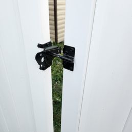 Gate latch comes undone all on it's even after having cinder blocks on either side of gate....worthless gate. Gate latch comes undone all on it's even after having cinder blocks on either side of gate....worthless gate.