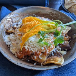 Chilaquiles with over easy eggs... Chilaquiles with over easy eggs...