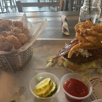 Tessie's bar & kitchen - The Calusa burger with garlic tots. - Burgers Near Me - Waltham, Massachusetts