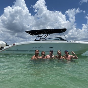Kokomo Charters - Posing with the boat near the sandbar - Boat Charters Near Me - Sarasota, Florida Kokomo Charters - Posing with the boat near the sandbar - Boat Charters Near Me - Sarasota, Florida