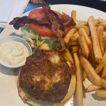 Colin's Seafood and Grill - Crab cake sandwich and fries add bacon - Cajun/Creole Near Me - Baltimore, Maryland