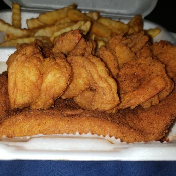 Malula - a plate of fried fish and french fries - American Near Me - Jacksonville, Florida Malula - a plate of fried fish and french fries - American Near Me - Jacksonville, Florida