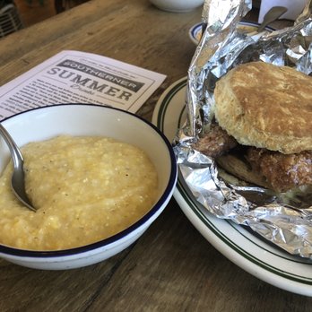 The Southerner - Creamy grits with chicken sandwich. - Southern Near Me - Saugatuck, Michigan