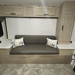 J&J Rent-A-Toy - When the queen bed is folded up, you have a small comfy seating area.