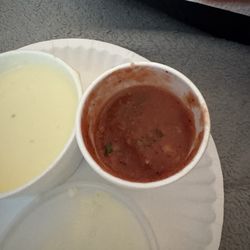 The bowl to left is Cheese Dip. The right is the tiny salsa just opened. Disappointing
