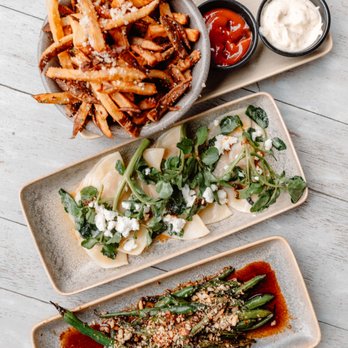 Moku Kitchen - Truffle Fries
Hawaiian Taro Ravioli
Szechuan Green Beans - Cocktail Bars Near Me - Honolulu, Hawaii Moku Kitchen - Truffle Fries
Hawaiian Taro Ravioli
Szechuan Green Beans - Cocktail Bars Near Me - Honolulu, Hawaii