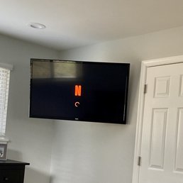 TV with full motion mount on drywall