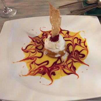 Bocaditos Bistro - Passion fruit lava cake is to die for , officially my new favorite dessert!!! - Breakfast & Brunch Near Me - New York, New York Bocaditos Bistro - Passion fruit lava cake is to die for , officially my new favorite dessert!!! - Breakfast & Brunch Near Me - New York, New York
