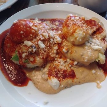 The Shop - Biscuits and gravy with chorizo gravy, red chile and poached eggs - Breakfast & Brunch Near Me - Albuquerque, New Mexico The Shop - Biscuits and gravy with chorizo gravy, red chile and poached eggs - Breakfast & Brunch Near Me - Albuquerque, New Mexico
