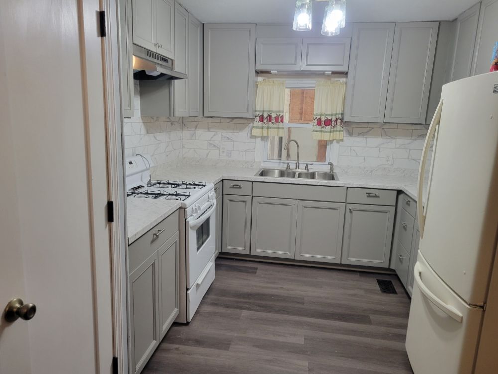 Slide of R and T Roofing and Remodeling