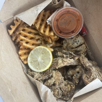 Community Kitchen + Taproom - Lemon Pepper Wangz & Waffle Fries - Vegan Near Me - Austin, Texas Community Kitchen + Taproom - Lemon Pepper Wangz & Waffle Fries - Vegan Near Me - Austin, Texas