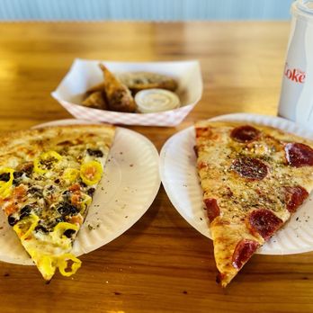 Slam Pizza & Cheesesteaks - Greek Pizza, Pepperoni Pizza, Cheesesteak Eggrolls with Homemade Ranch Dressing - Cheesesteaks Near Me - Sanford, Florida Slam Pizza & Cheesesteaks - Greek Pizza, Pepperoni Pizza, Cheesesteak Eggrolls with Homemade Ranch Dressing - Cheesesteaks Near Me - Sanford, Florida