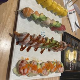Mango roll, rainbow roll, Hawaiian roll, Naruto roll with Kanu Mango roll, rainbow roll, Hawaiian roll, Naruto roll with Kanu
