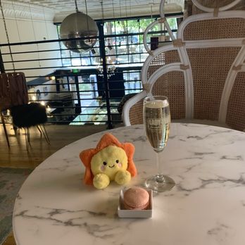 Lady Yum - Pioneer Square - Prosecco with a wild strawberry macaron - Macarons Near Me - Seattle, Washington