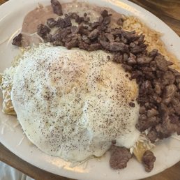 Chilaquiles with carne asada Chilaquiles with carne asada