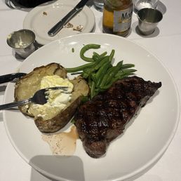 NY Strip, baked potato and green beans. NY Strip, baked potato and green beans.