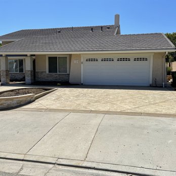 Rock Hard Effex - After: stamped concrete driveway, color: Mesa Buff - Masonry/Concrete Near Me
