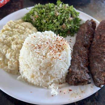 Dunya Fresh Halal Food - Iraqi Lamb Kebab On Basmati Rice. The tabouli was so overly sour it was hard to even eat one leaf of parsley. - Middle Eastern Near Me - Orange Park, Florida Dunya Fresh Halal Food - Iraqi Lamb Kebab On Basmati Rice. The tabouli was so overly sour it was hard to even eat one leaf of parsley. - Middle Eastern Near Me - Orange Park, Florida