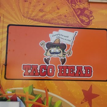 Taco Head - taco head on the side of a food truck - Tacos Near Me
