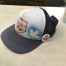Friends hat with some neat running group bling Friends hat with some neat running group bling 