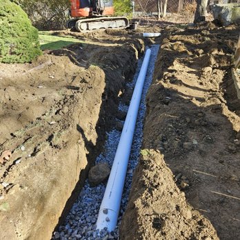 Driveway Masters - French Drain - Masonry/Concrete Near Me - Bedford Hills, New York Driveway Masters - French Drain - Masonry/Concrete Near Me - Bedford Hills, New York