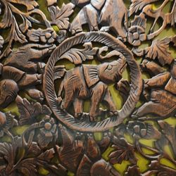 Angkor Cambodian Café - Elephant wood carving on a wall
