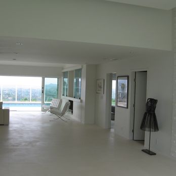 KD Design - a living room with a view of the pool - Architects Near Me