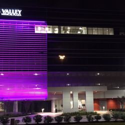 International Medicine Center - Front of the new location of the International Medicine Center at night.
