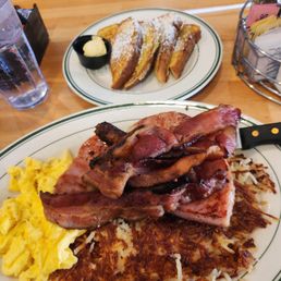 Hashbrowns, scrambled eggs, 4 bacon, 4 sausage, ham steak and French toast for just over $20