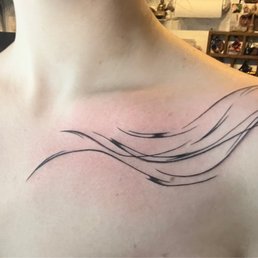 Collar bone tattoo