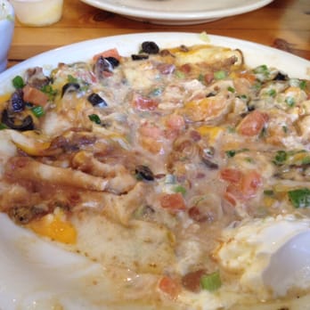 Donner Lake Kitchen - The huevos rancheros looked like a cross between a cheese pizza and throw up. - Breakfast & Brunch Near Me - Truckee, California Donner Lake Kitchen - The huevos rancheros looked like a cross between a cheese pizza and throw up. - Breakfast & Brunch Near Me - Truckee, California