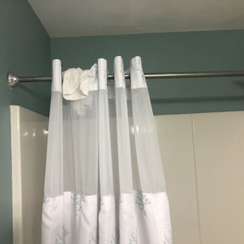 Bryant Real Estate - Previous used washcloth hanging on shower curtain. - Property Management Near Me - Wrightsville Beach, North Carolina Bryant Real Estate - Previous used washcloth hanging on shower curtain. - Property Management Near Me - Wrightsville Beach, North Carolina