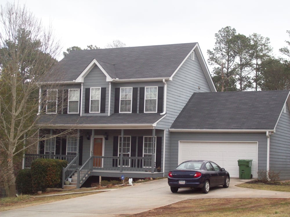 Slide of T&T Roofing and Repair