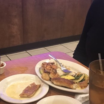 Texas Seafood And Steakhouse - a plate of food on a table - Seafood Near Me - Dayton, Texas Texas Seafood And Steakhouse - a plate of food on a table - Seafood Near Me - Dayton, Texas