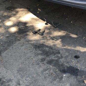 Western Towing - Bolts just laying on the ground under the car. How did they just "coincidentally fall" from being towed??? - Towing Near Me - San Marcos, California