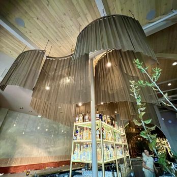 Chispa Food | Drink - View from the bar -- love those gold metal mesh hangings - Cocktail Bars Near Me - Napa, California