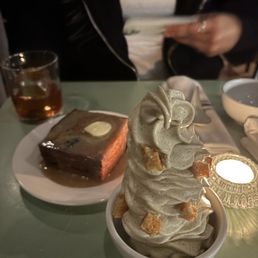 Hong Kong black sesame toast and jasmine milk tea soft serve. Hong Kong black sesame toast and jasmine milk tea soft serve.
