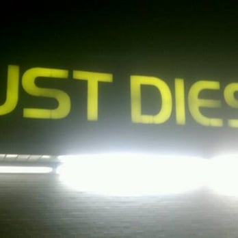 Just Diesel - a car driving down a street at night - Gas Stations Near Me - Cedar Rapids, Iowa Just Diesel - a car driving down a street at night - Gas Stations Near Me - Cedar Rapids, Iowa