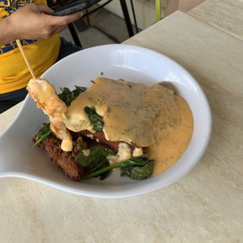 Ruby Slipper Baton Rouge - Fish and grit cakes with tomatoes and spinach - Cafes Near Me - Baton Rouge, Louisiana